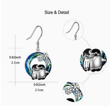 Load image into Gallery viewer, Snowflakes Hugging Two Penguins Round Pendant Earrings