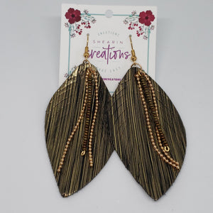 Black and gold faux leather earrings.