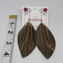 Load image into Gallery viewer, Black and gold faux leather earrings.